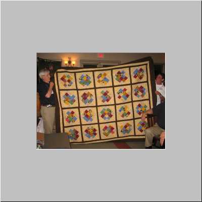 174-2009(300)HenryWifholm-MelLutgring-MarkKlindt's-mother's-auctioned-quilt.jpg