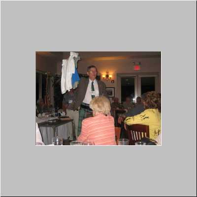 174-2009(307)JimMcDaniel-auctioning-tshirts.jpg