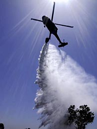 UH-60 dropping 600 gallons of water